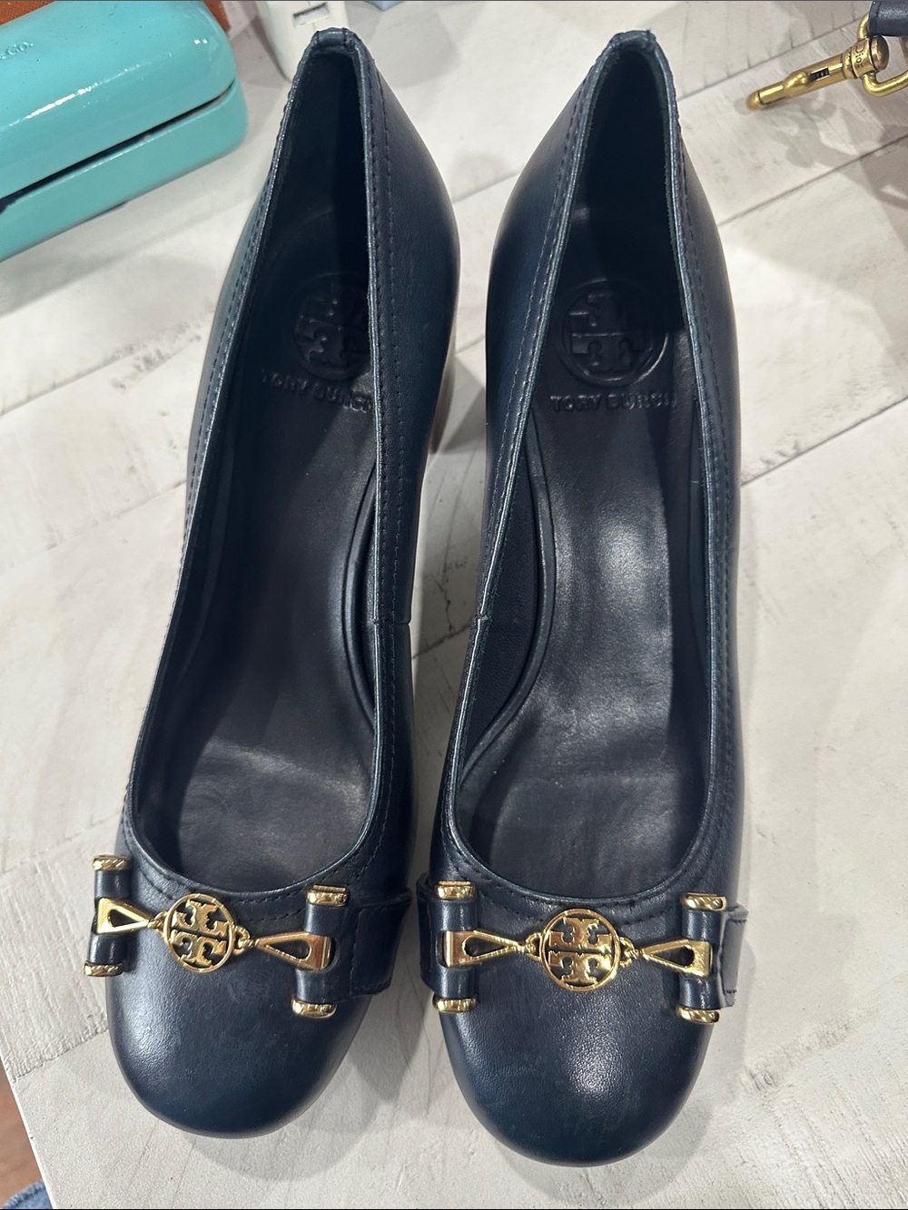 Tory Burch Navy Leather pumps block heel, round toe, and a gold-toned logo